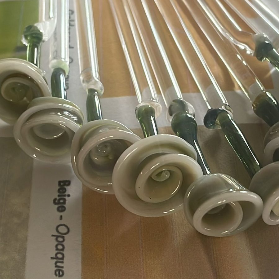 Glass stir sticks with spiral tops in beige and green